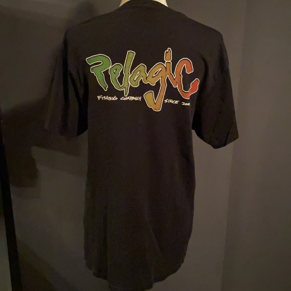 Pelagic stretch T with Rasta Colored Font